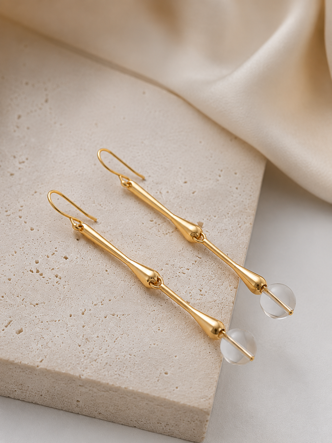 Lume Drop Earrings polished gold-tone dangle earrings detail