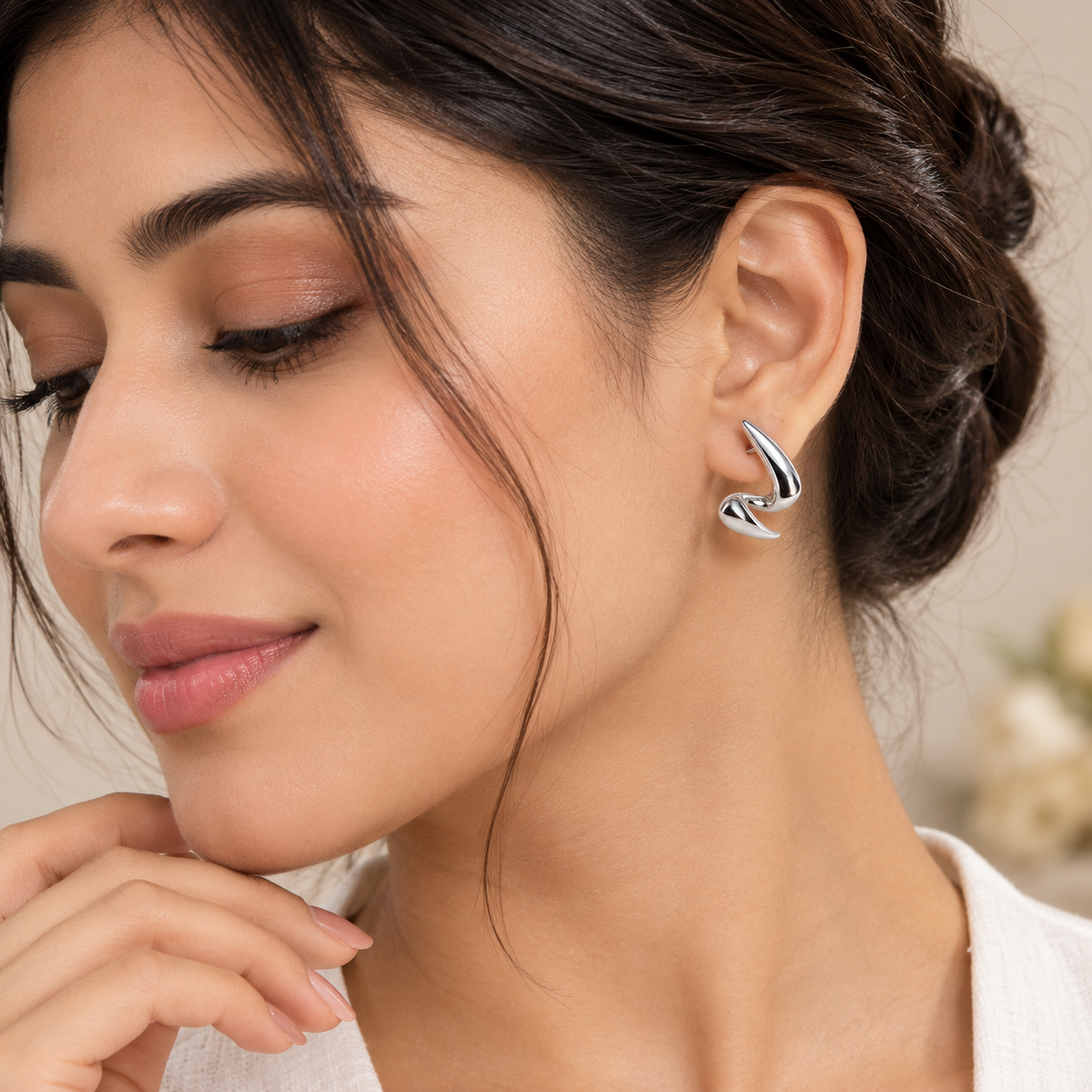 Volute Spiral Earrings worn on model